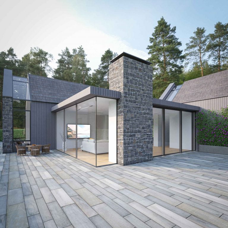 A modern stone-clad building with large floor-to-ceiling panoramic windows and a skylight to provide more natural daylight inside, surrounded by a beautiful coniferous forest in the background.